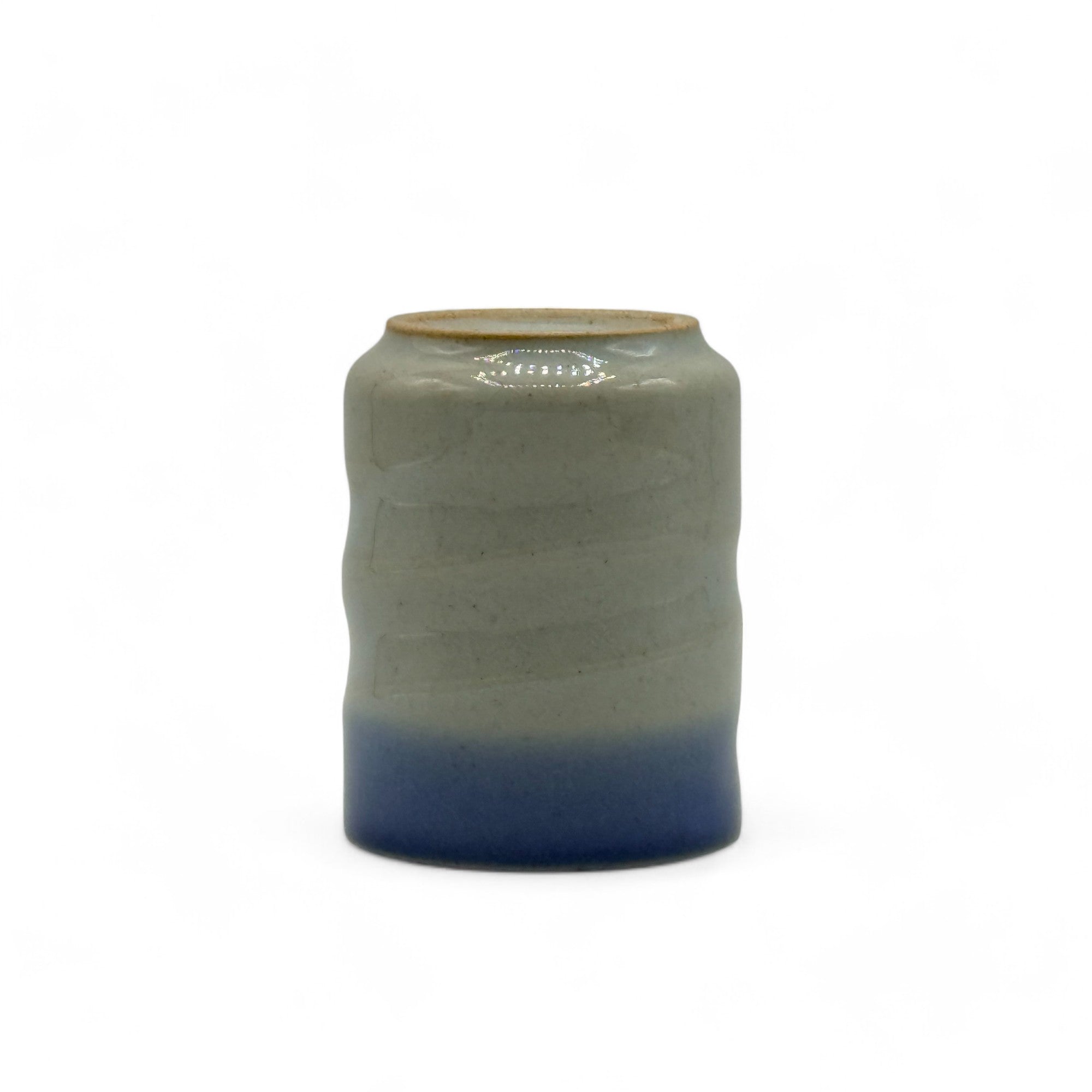 Handcrafted Mino-yaki Yunomi Japanese teacup with traditional glaze, perfect for daily tea rituals.