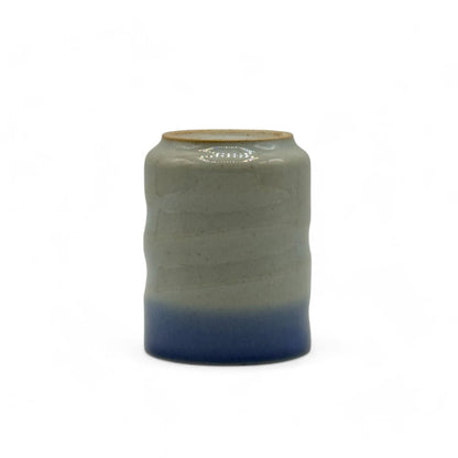 Handcrafted Mino-yaki Yunomi Japanese teacup with traditional glaze, perfect for daily tea rituals.