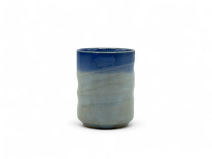 Handcrafted Mino-yaki Yunomi Japanese teacup with traditional glaze, perfect for daily tea rituals.