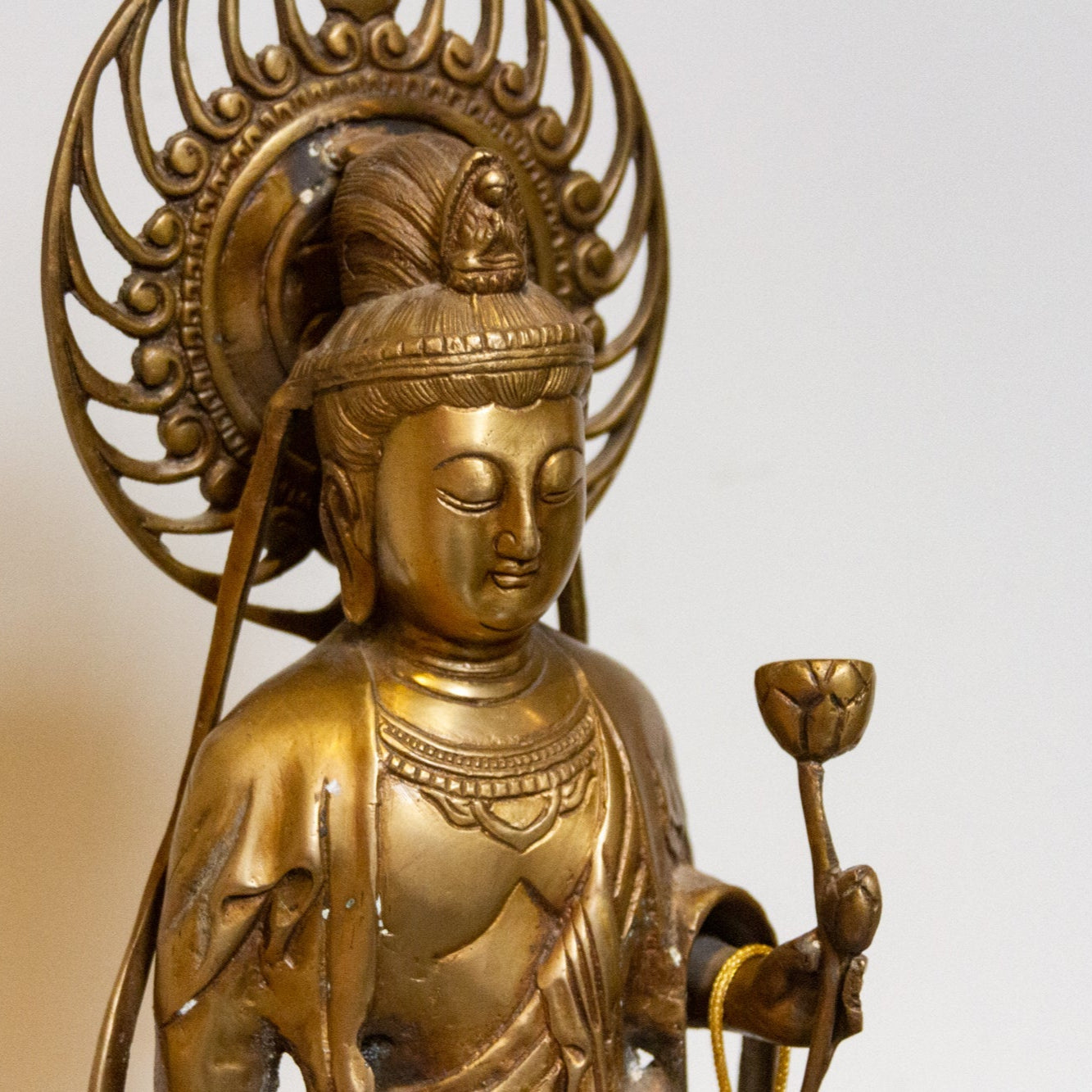Vintage Japanese brass Buddha statue from the mid-20th century, tall Butsuzō sculpture with intricate details and serene expression.