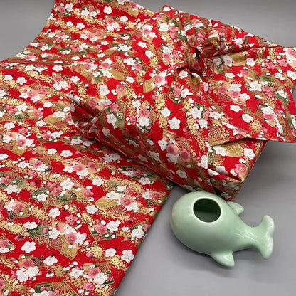 Eco-friendly Japanese furoshiki wrapping cloth in elegant traditional patterns, reusable for sustainable gift wrapping solutions.