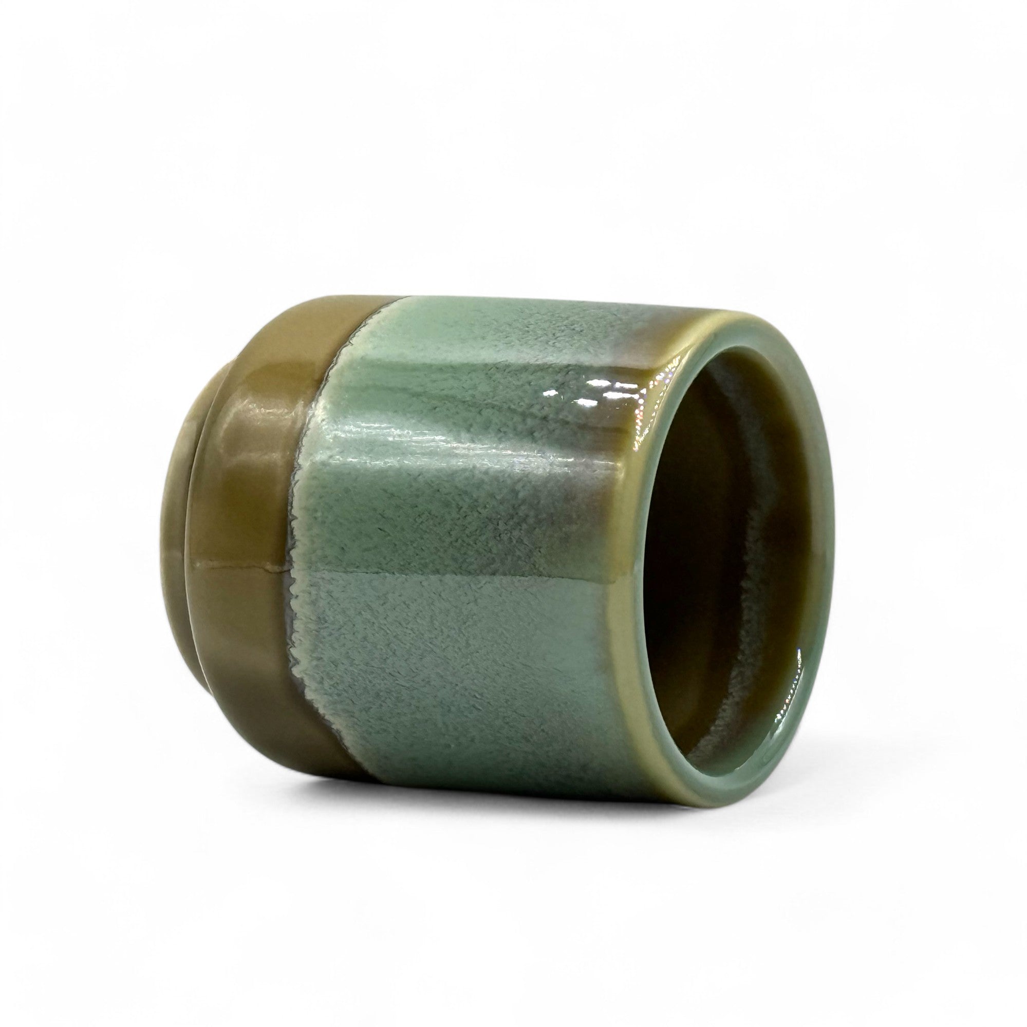 Handcrafted Mino-yaki Yunomi Japanese teacup with traditional glaze, perfect for daily tea rituals.