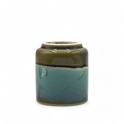 Handcrafted Mino-yaki Yunomi Japanese teacup with traditional glaze, perfect for daily tea rituals.