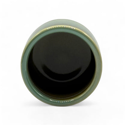 Handcrafted Mino-yaki Yunomi Japanese teacup with traditional glaze, perfect for daily tea rituals.