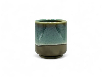 Handcrafted Mino-yaki Yunomi Japanese teacup with traditional glaze, perfect for daily tea rituals.