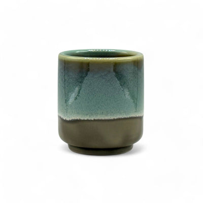 Handcrafted Mino-yaki Yunomi Japanese teacup with traditional glaze, perfect for daily tea rituals.