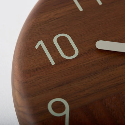 Handcrafted Japanese Hagi wooden clock with round face, minimalist and traditional design.