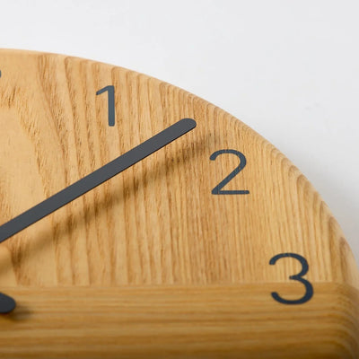 Handcrafted Japanese Hagi wooden clock with round face, minimalist and traditional design.