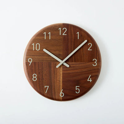 Handcrafted Japanese Hagi wooden clock with round face, minimalist and traditional design.