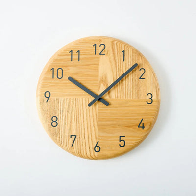 Handcrafted Japanese Hagi wooden clock with round face, minimalist and traditional design.