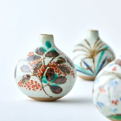 Handmade Japanese Hagi Tesai Kabin ceramic flower vase in traditional wabi-sabi style for Ikebana or minimalist home décor.