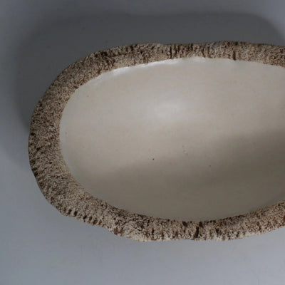Hakuwa white oval bowl made from Japanese semi-porcelain and clay, handcrafted tableware for modern dining.