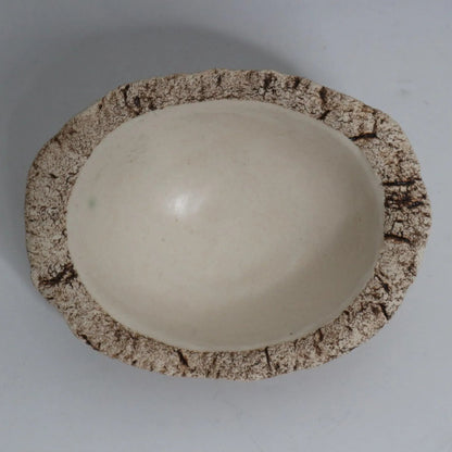 Hakuwa white oval bowl made from Japanese semi-porcelain and clay, handcrafted tableware for modern dining.