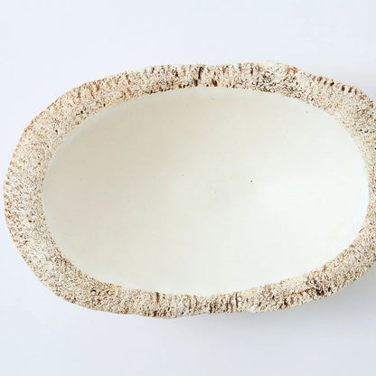 Hakuwa white oval bowl made from Japanese semi-porcelain and clay, handcrafted tableware for modern dining.