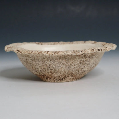 Hakuwa white oval bowl made from Japanese semi-porcelain and clay, handcrafted tableware for modern dining.