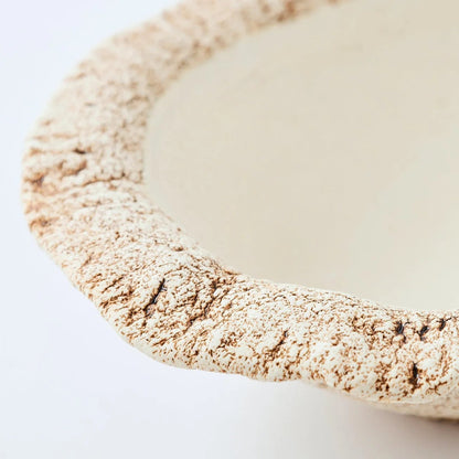 Hakuwa white oval bowl made from Japanese semi-porcelain and clay, handcrafted tableware for modern dining.