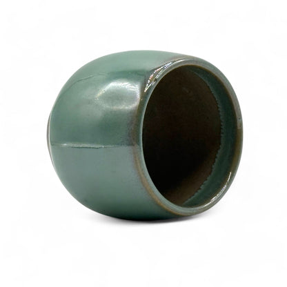 Handcrafted Mino-yaki Yunomi Japanese teacup with traditional glaze, perfect for daily tea rituals.