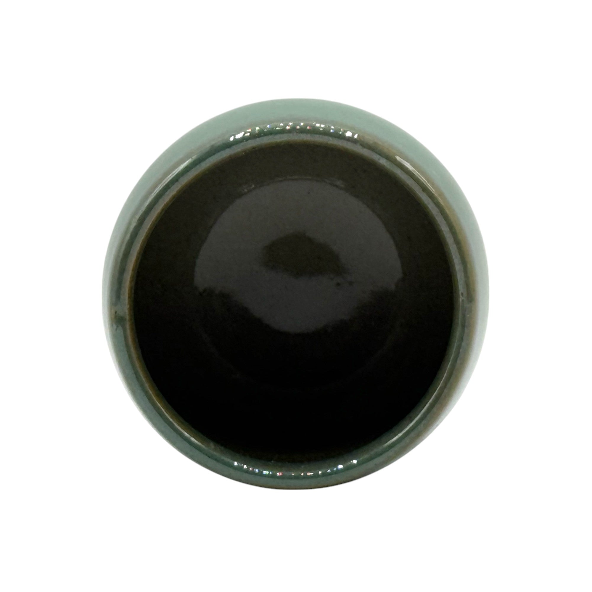 Handcrafted Mino-yaki Yunomi Japanese teacup with traditional glaze, perfect for daily tea rituals.