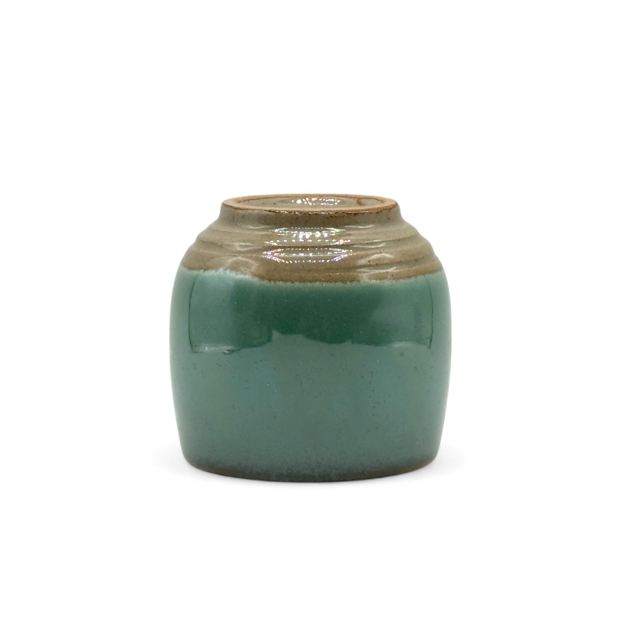 Handcrafted Mino-yaki Yunomi Japanese teacup with traditional glaze, perfect for daily tea rituals.