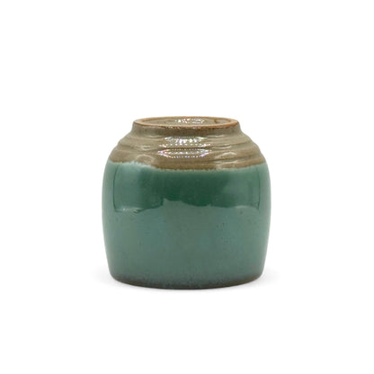 Handcrafted Mino-yaki Yunomi Japanese teacup with traditional glaze, perfect for daily tea rituals.