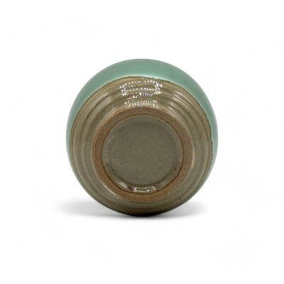 Handcrafted Mino-yaki Yunomi Japanese teacup with traditional glaze, perfect for daily tea rituals.