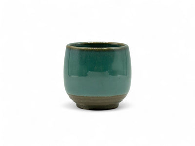 Handcrafted Mino-yaki Yunomi Japanese teacup with traditional glaze, perfect for daily tea rituals.