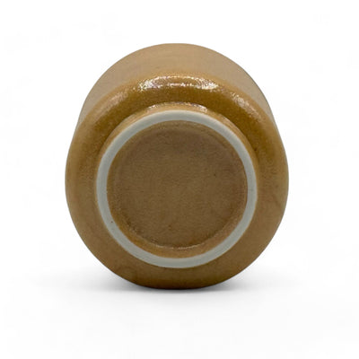 Handcrafted Shigaraki-yaki Yunomi Japanese teacup with traditional glaze, perfect for daily tea rituals.