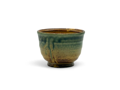 Handcrafted Mino-yaki Yunomi Japanese Sencha teacup with traditional glaze, perfect for daily tea rituals.