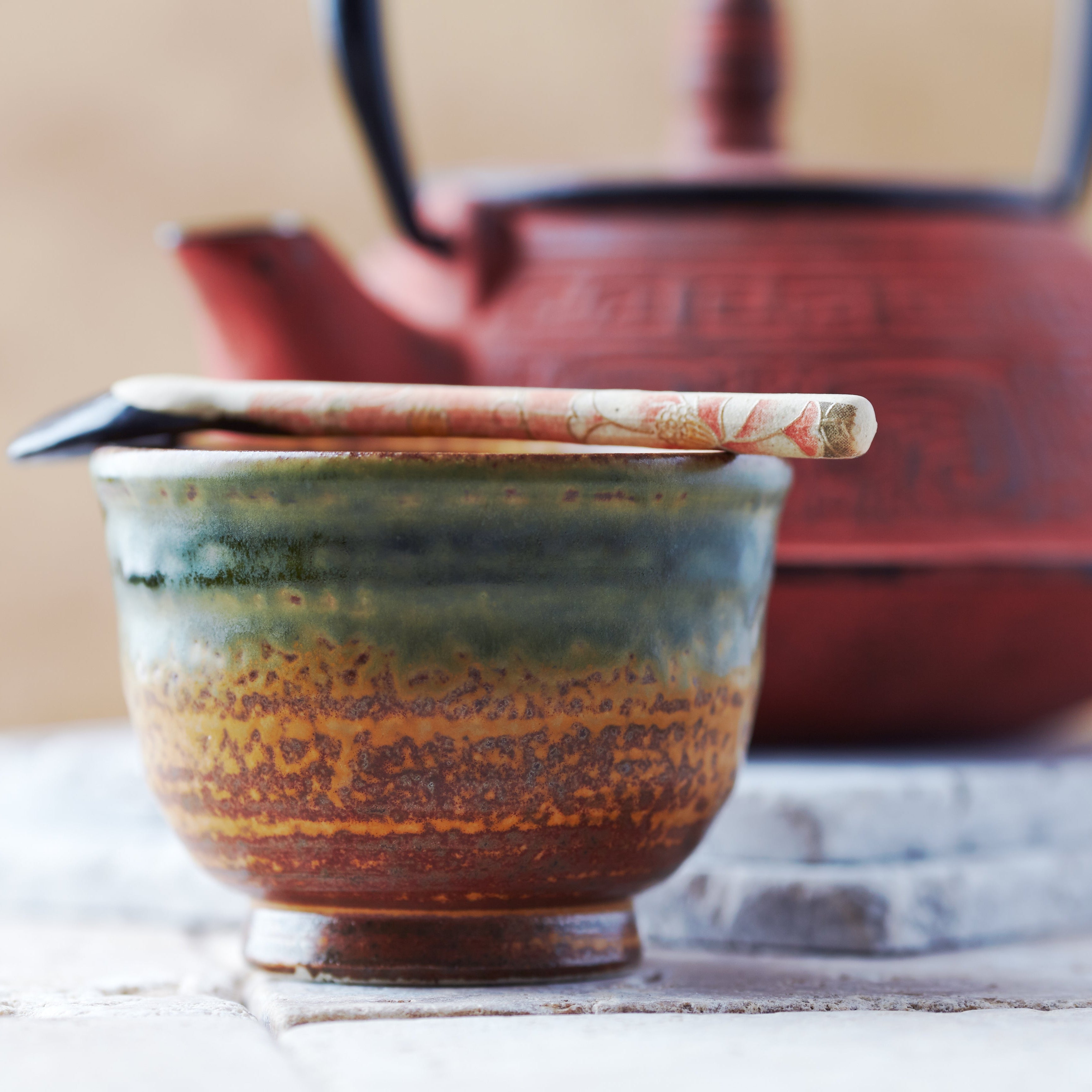 Handcrafted Mino-yaki Yunomi Japanese Sencha teacup with traditional glaze, perfect for daily tea rituals.