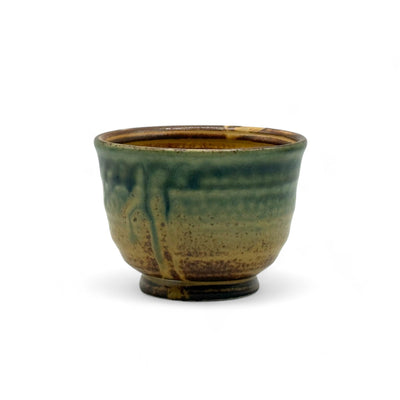 Handcrafted Mino-yaki Yunomi Japanese Sencha teacup with traditional glaze, perfect for daily tea rituals.