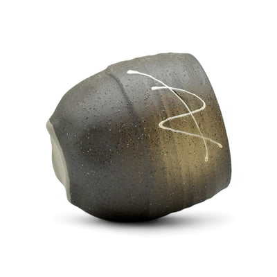 Handcrafted Mino-yaki Yunomi Japanese teacup with traditional glaze, perfect for daily tea rituals.