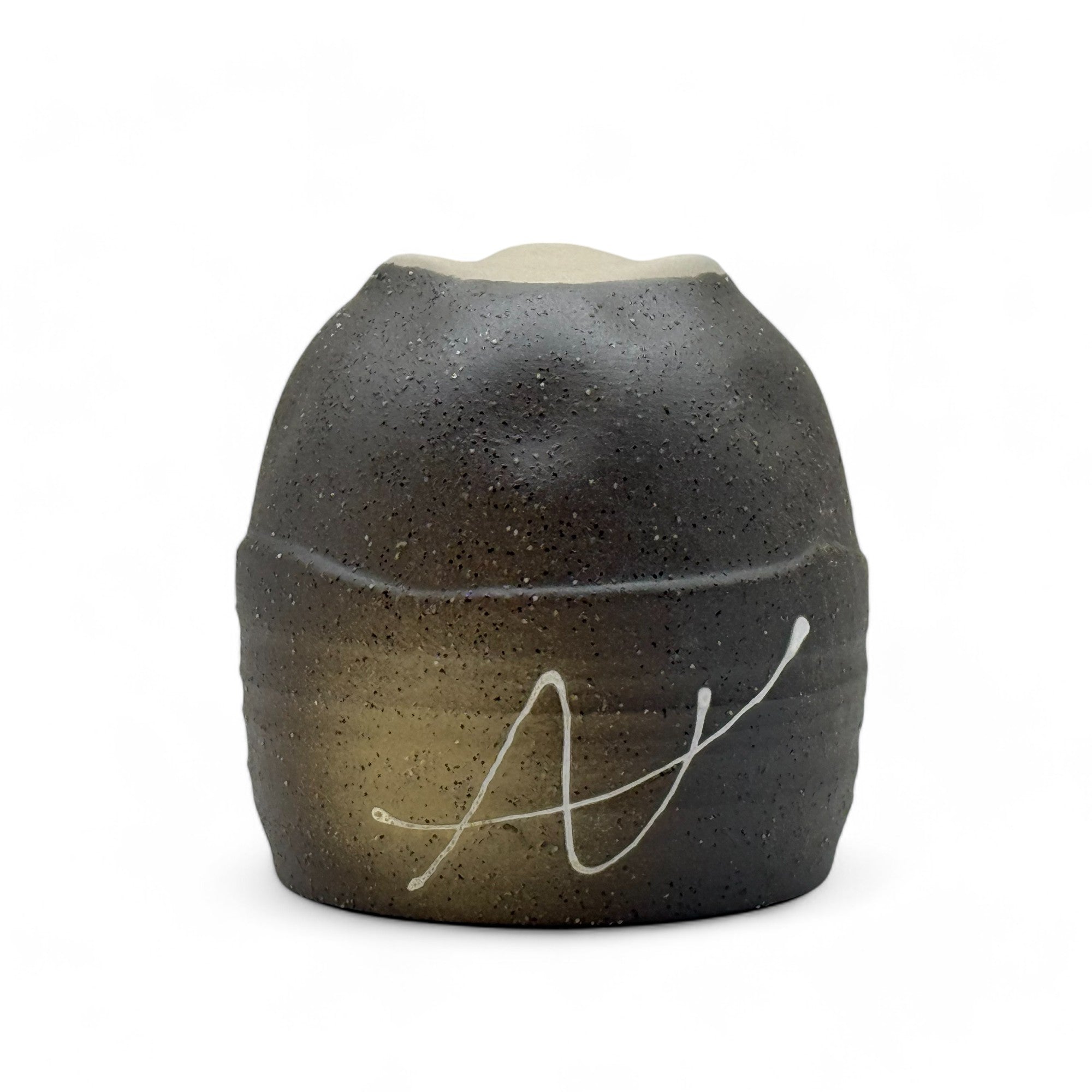 Handcrafted Mino-yaki Yunomi Japanese teacup with traditional glaze, perfect for daily tea rituals.