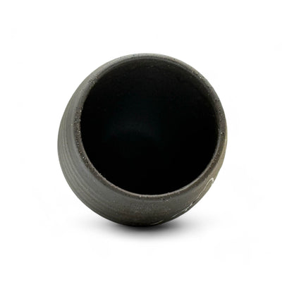 Handcrafted Mino-yaki Yunomi Japanese teacup with traditional glaze, perfect for daily tea rituals.