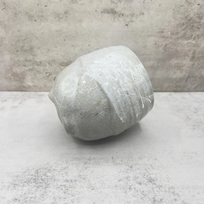 Handcrafted Mino-yaki Yunomi Japanese teacup with traditional glaze, perfect for daily tea rituals.