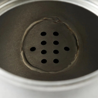 Ishinagare Japanese stone-washed stainless steel teapot, durable and elegant for premium tea brewing.