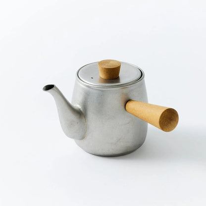 Ishinagare Japanese stone-washed stainless steel teapot, durable and elegant for premium tea brewing.