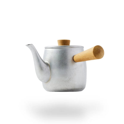 Ishinagare Japanese stone-washed stainless steel teapot, durable and elegant for premium tea brewing.