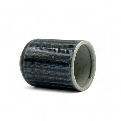 Handcrafted Mino-yaki Yunomi Japanese teacup with traditional glaze, perfect for daily tea rituals.