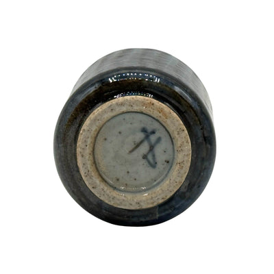 Handcrafted Mino-yaki Yunomi Japanese teacup with traditional glaze, perfect for daily tea rituals.