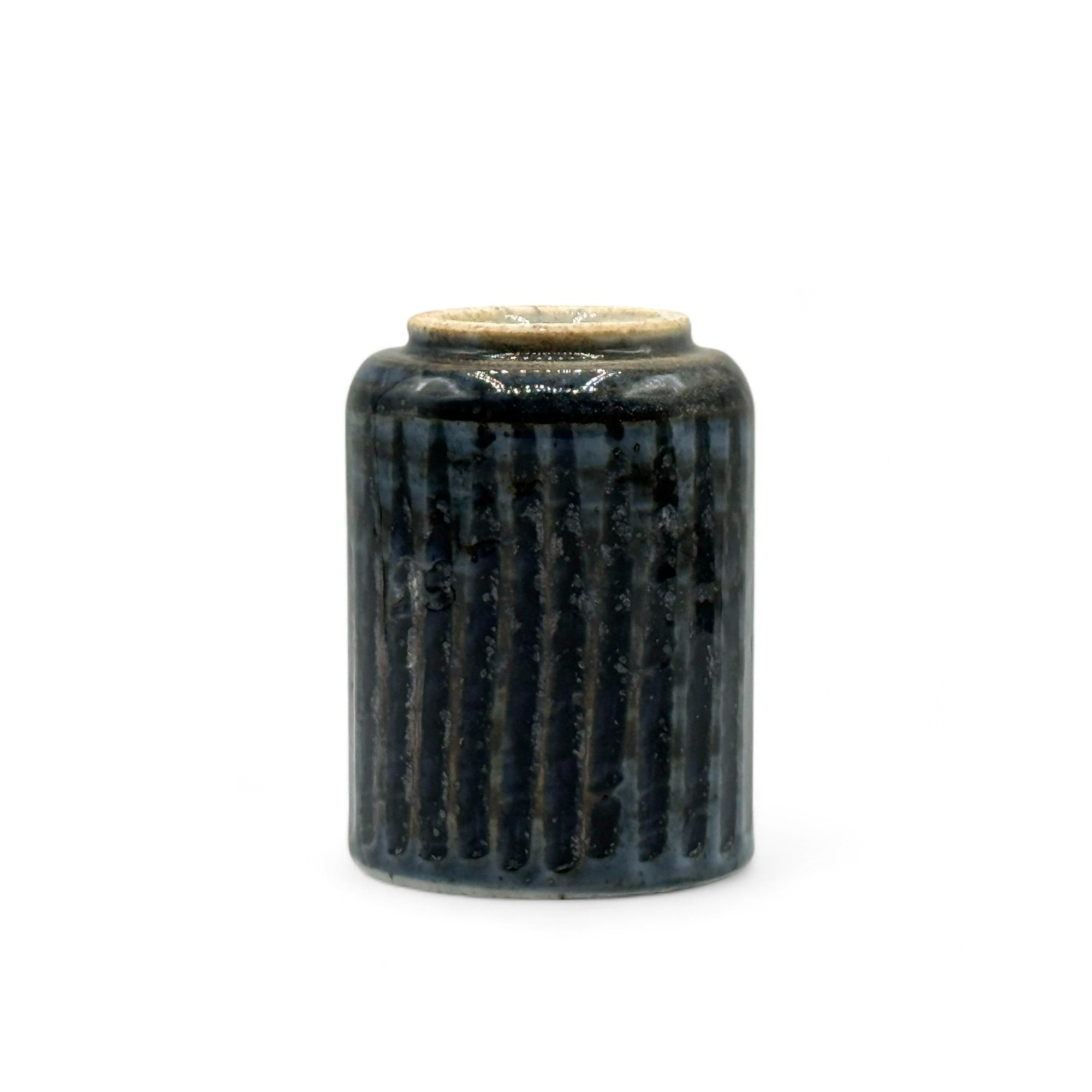 Handcrafted Mino-yaki Yunomi Japanese teacup with traditional glaze, perfect for daily tea rituals.