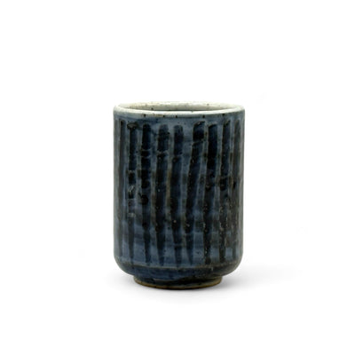 Handcrafted Mino-yaki Yunomi Japanese teacup with traditional glaze, perfect for daily tea rituals.