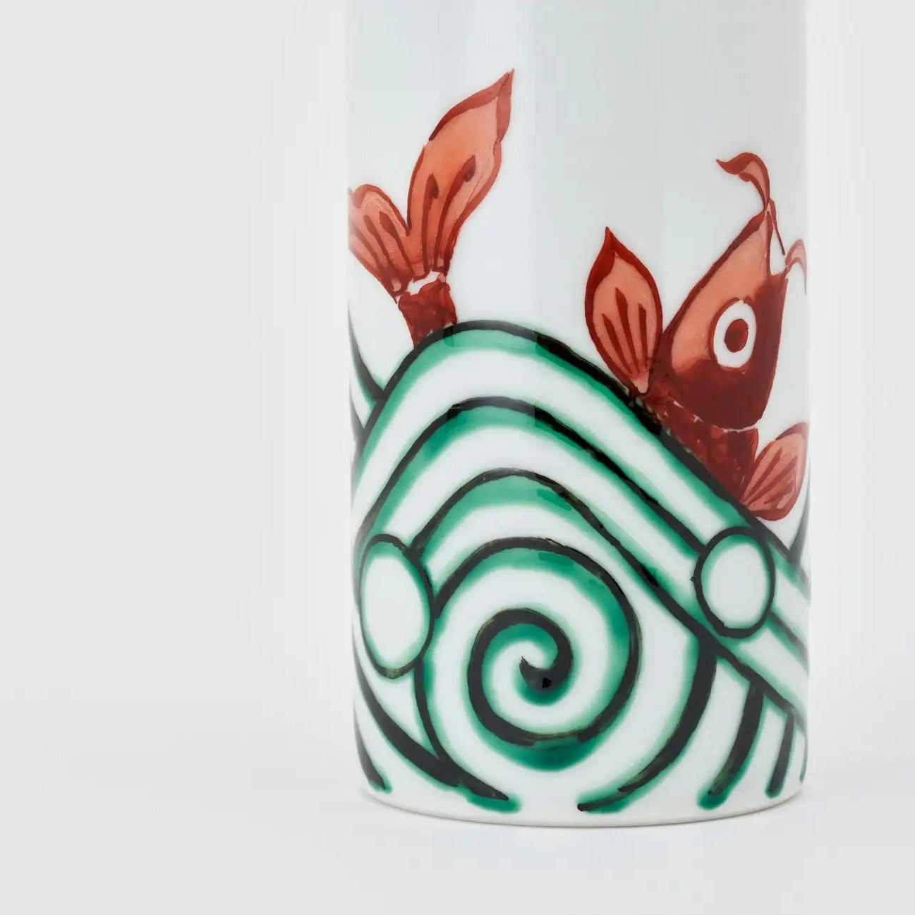 Handmade Japanese ceramic flower vase with koi carp and wave design, traditional decor accent piece.