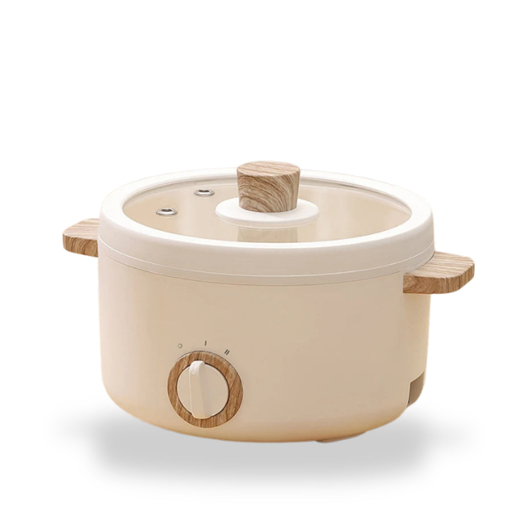 Japanese multi-functional electric mini cooker boiling pot, compact design for boiling, steaming, and cooking, perfect for small spaces.