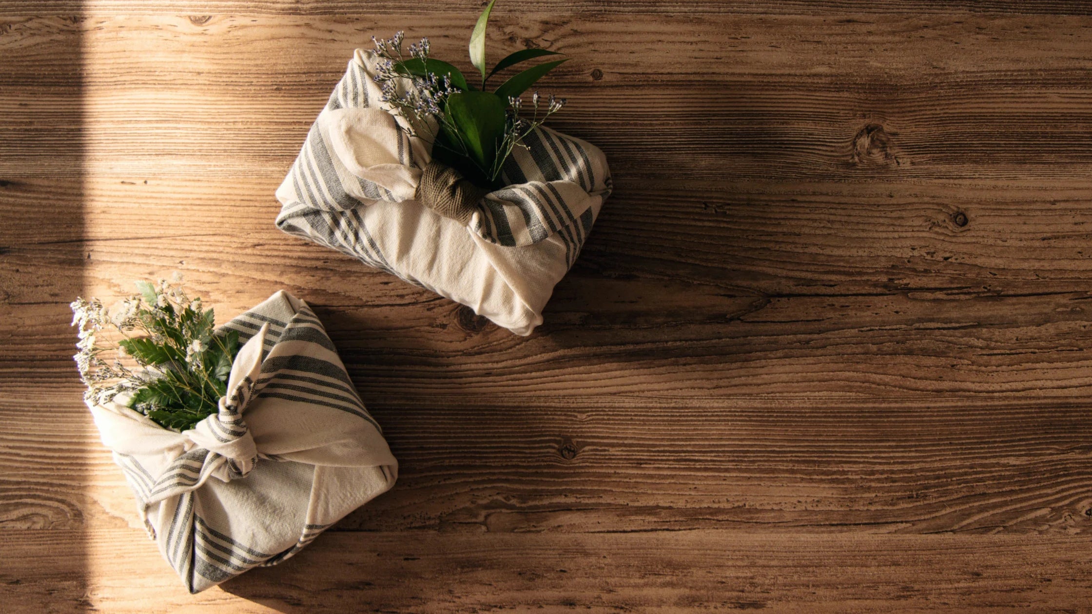 Beautiful Japanese Furoshiki gift wrapping with reusable fabric wraps, showcasing eco-friendly and sustainable design.