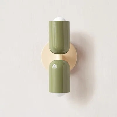 Japanese macaron wall lamp with up-down lighting, perfect for ambient light in modern or minimalist home decor settings.