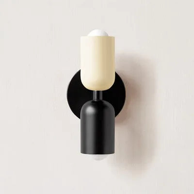 Japanese macaron wall lamp with up-down lighting, perfect for ambient light in modern or minimalist home decor settings.