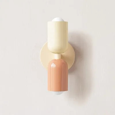 Japanese macaron wall lamp with up-down lighting, perfect for ambient light in modern or minimalist home decor settings.