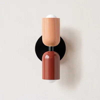 Japanese macaron wall lamp with up-down lighting, perfect for ambient light in modern or minimalist home decor settings.