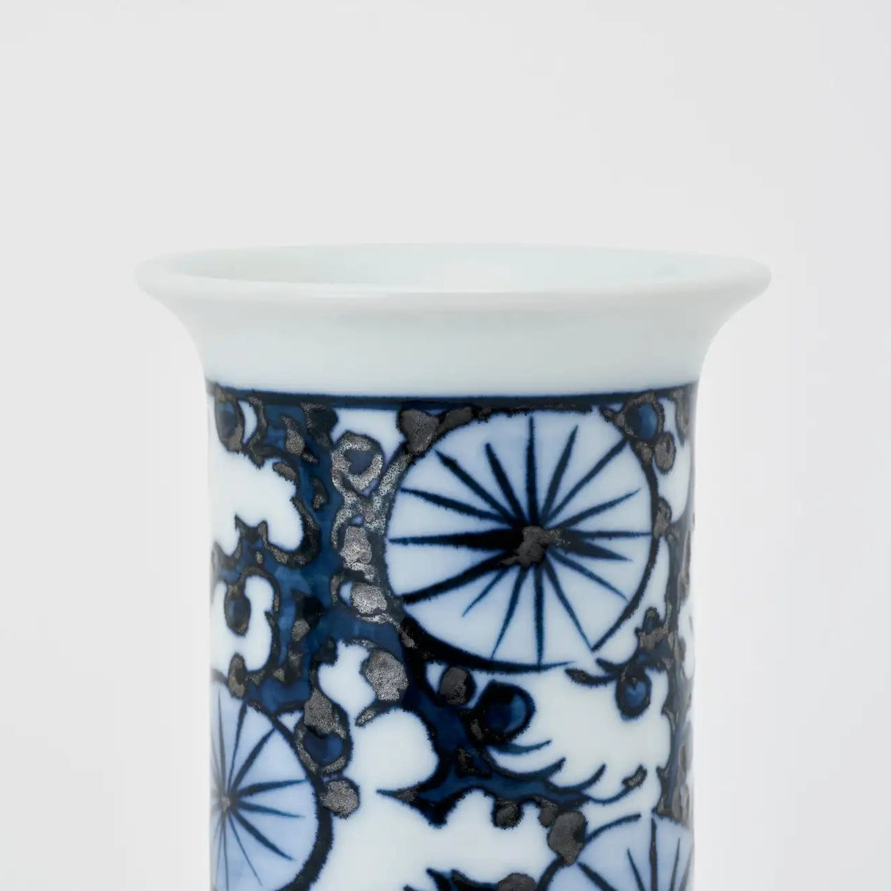 Handcrafted Japanese ceramic flower vase with pine tree design, perfect for minimalist or Zen-inspired home decor.