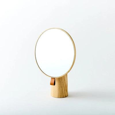 Elegant Japanese pivot mirror with 360° rotating design, perfect for modern and minimalist interior spaces.